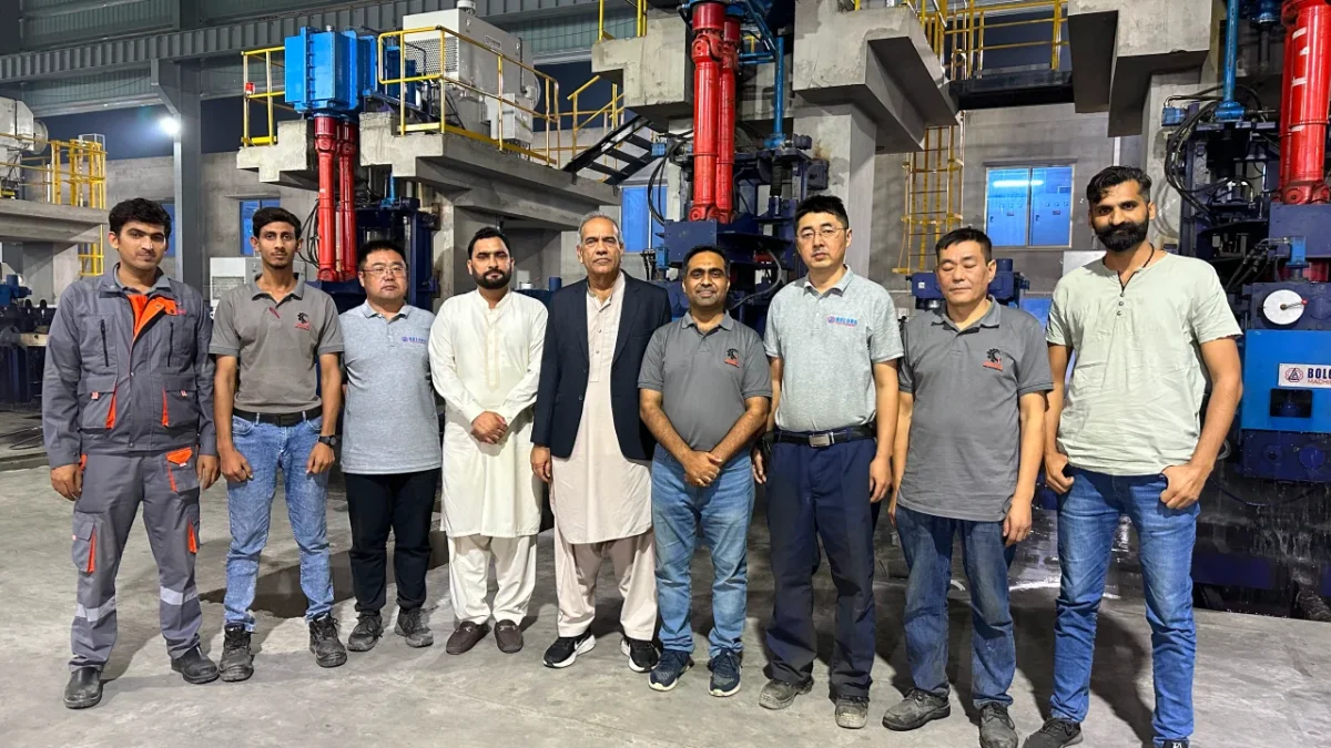 Group photo of teams of Hunza Steel, Unisons Steel Solutions and Bolong Machinery after commissioning of Rolling Mill